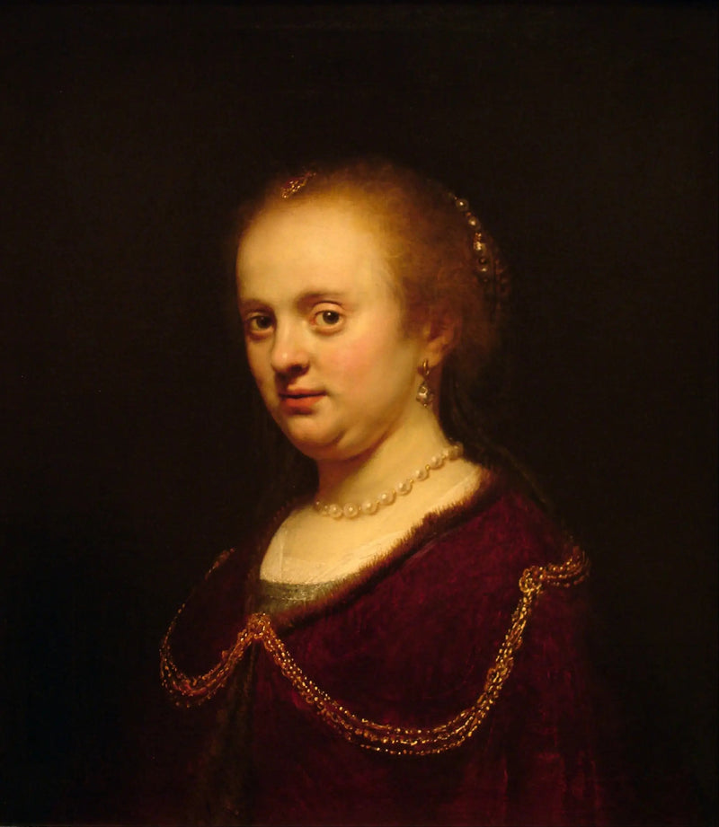 Jeune femme avec une chaîne en or - Rembrandt