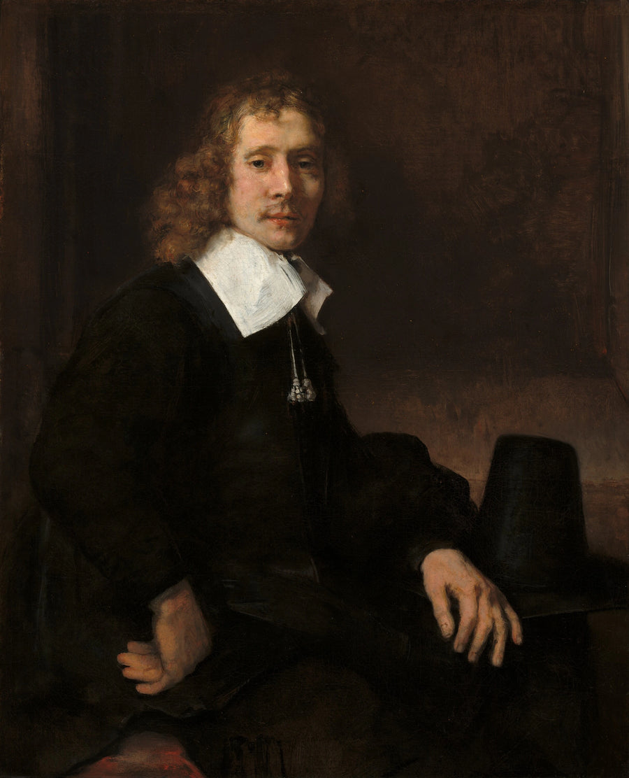 Jeune homme assis à une table – Rembrandt, vers 1660