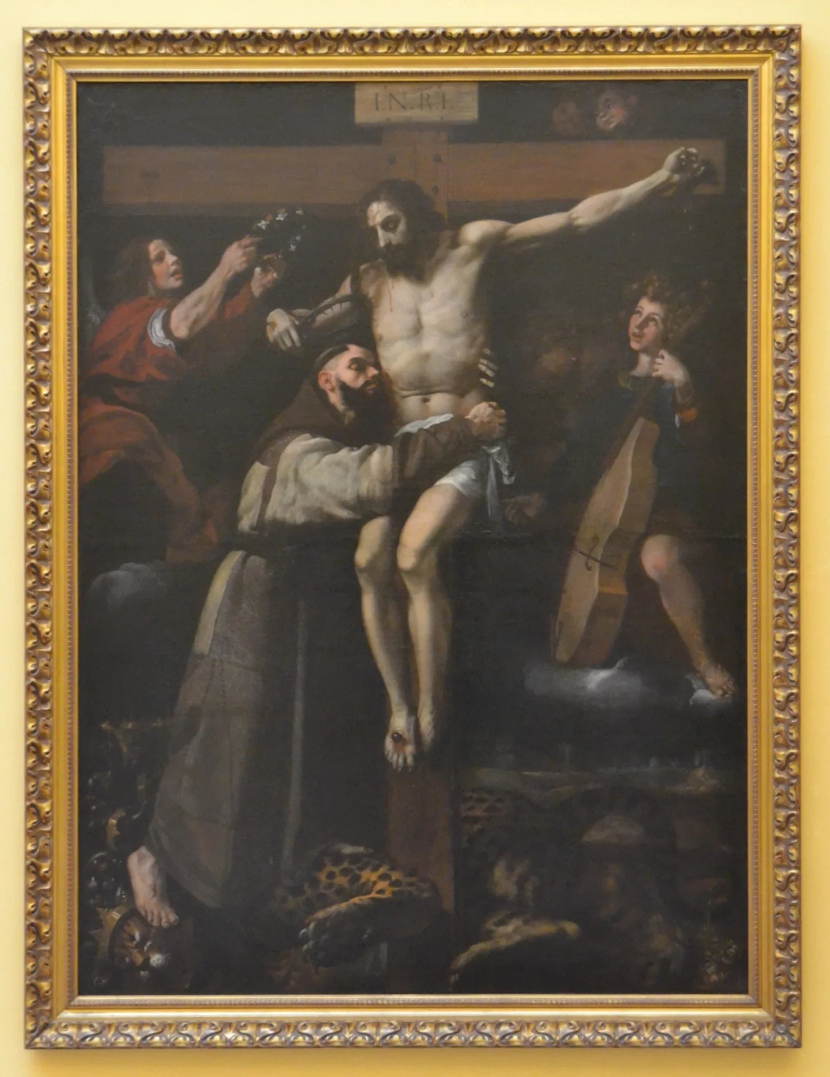 Saint François d'Assise embrassant le Christ sur la croix - Francisco Ribalta image 1 tableau peint à l’huile sur toile